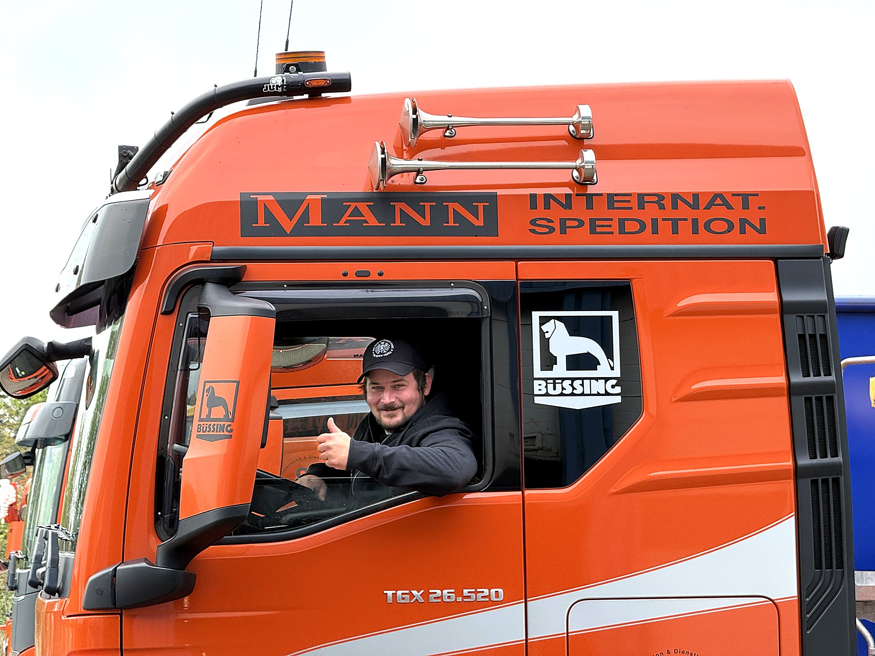 MANN Fahrer in seinem Fahrzeug